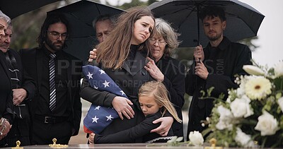 Buy stock photo Funeral, family hug and sad people with grief support, goodbye service and mourning death at burial event. Kid child, mom embrace and group gathering together at coffin, casket and crying at ceremony