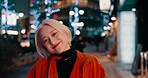 Happy woman, portrait and night in Japanese city of Tokyo with freedom on travel, adventure or journey. Gen z, girl or excited to explore urban town street on vacation or holiday with neon lights