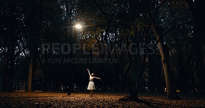 Buy stock photo Ballet, dance and woman outdoor at night in Japan with street light, trees and creative art. Ballerina, performance and talent in dark Kyoto forest, woods or garden with spotlight in nature or park