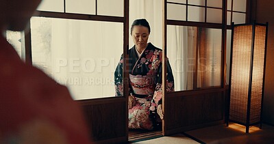 Buy stock photo Woman, Japanese and tea ceremony for healing practice or respect for ritual, wellness or tatami room. Female person, kneel and warm drink for mindfulness zen in Tokyo for spiritual, health or calm