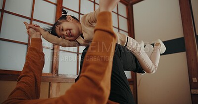 Buy stock photo Parent, home and playing with daughter, happy and smile for joy, japanese and childhood memories. Adult, girl and fun with child, living room floor and parenting together for joy, carefree and care
