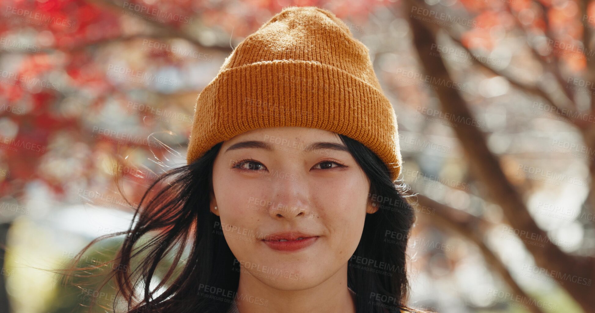 Buy stock photo Japanese woman, portrait and smile in forest with red leaves, trees or nature for adventure in autumn. Girl, person and happy with headshot, outdoor or vacation in woods, park or environment in Tokyo