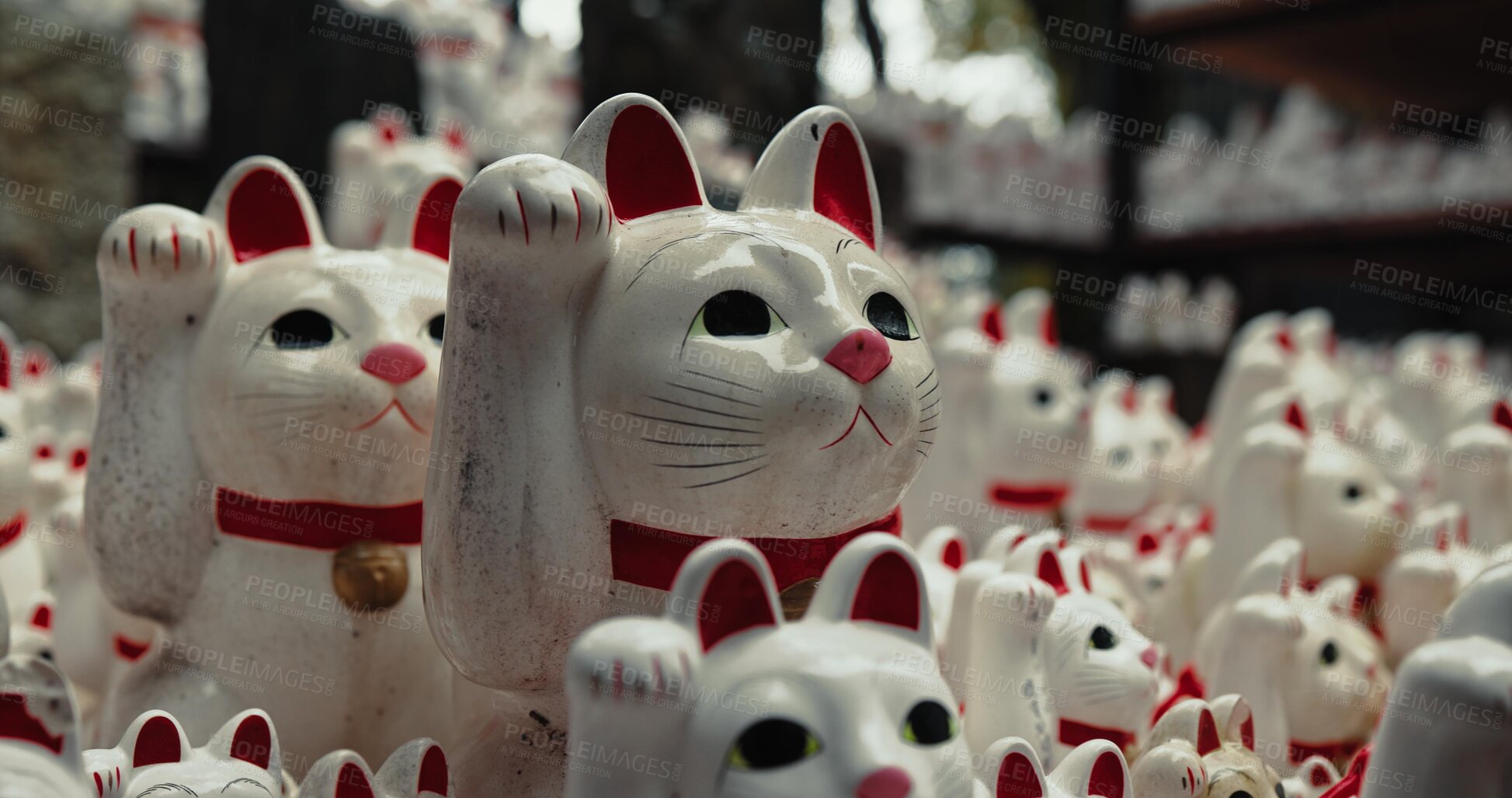 Buy stock photo Lucky cat, religion and Shinto shrine in nature, trees and forest with wish, faith or culture environment. Animal, toys and temple for statue, worship or Buddhism with icon, symbol or wave in Japan