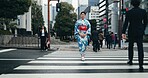 Woman, Japanese traditional dress and walking in city, zebra crossing and travel with journey outdoor. Fashion, adventure and urban street in Kyoto, kimono for culture and style with local trip