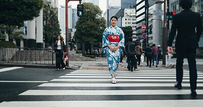 Buy stock photo Woman, Japanese traditional dress and walking in city, zebra crossing and travel with journey outdoor. Fashion, adventure and urban street in Kyoto, kimono for culture and style with local trip