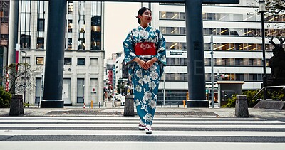 Buy stock photo Woman, Japanese traditional clothes and walking in city, zebra crossing and travel with journey outdoor. Fashion, adventure and urban street in Kyoto, kimono or dress for culture and style with trip