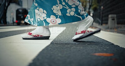 Buy stock photo Japanese woman, feet and walking in kimono in city, journey and wellness for heritage by outdoor. Person, steps and traditional clothes in tokyo for holiday and pedestrian crossing in japan fashion