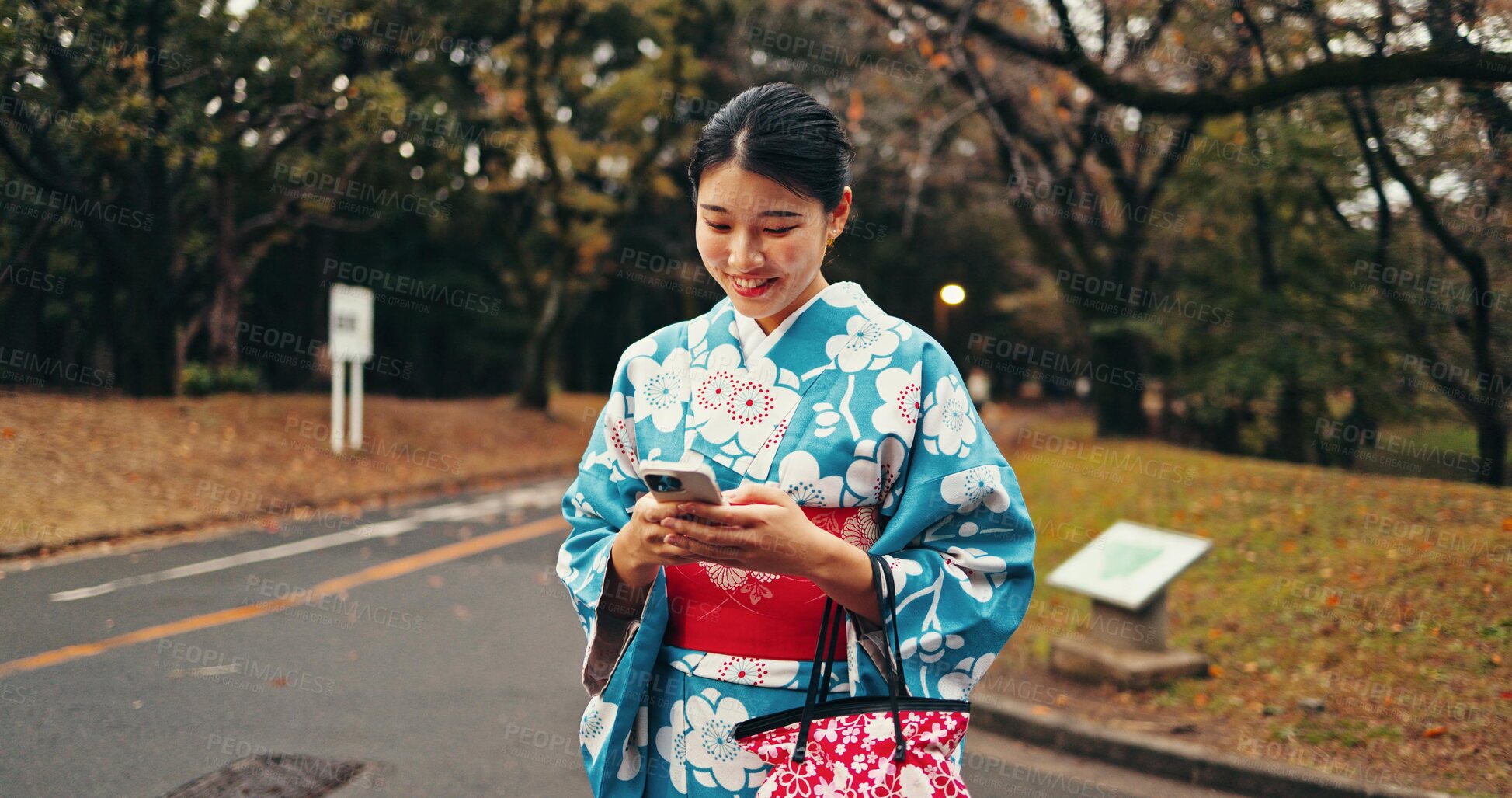 Buy stock photo City, phone and Japanese woman in street for online networking, website and social media. Travel, walking and happy person typing on smartphone with traditional fashion, culture and kimono in nature