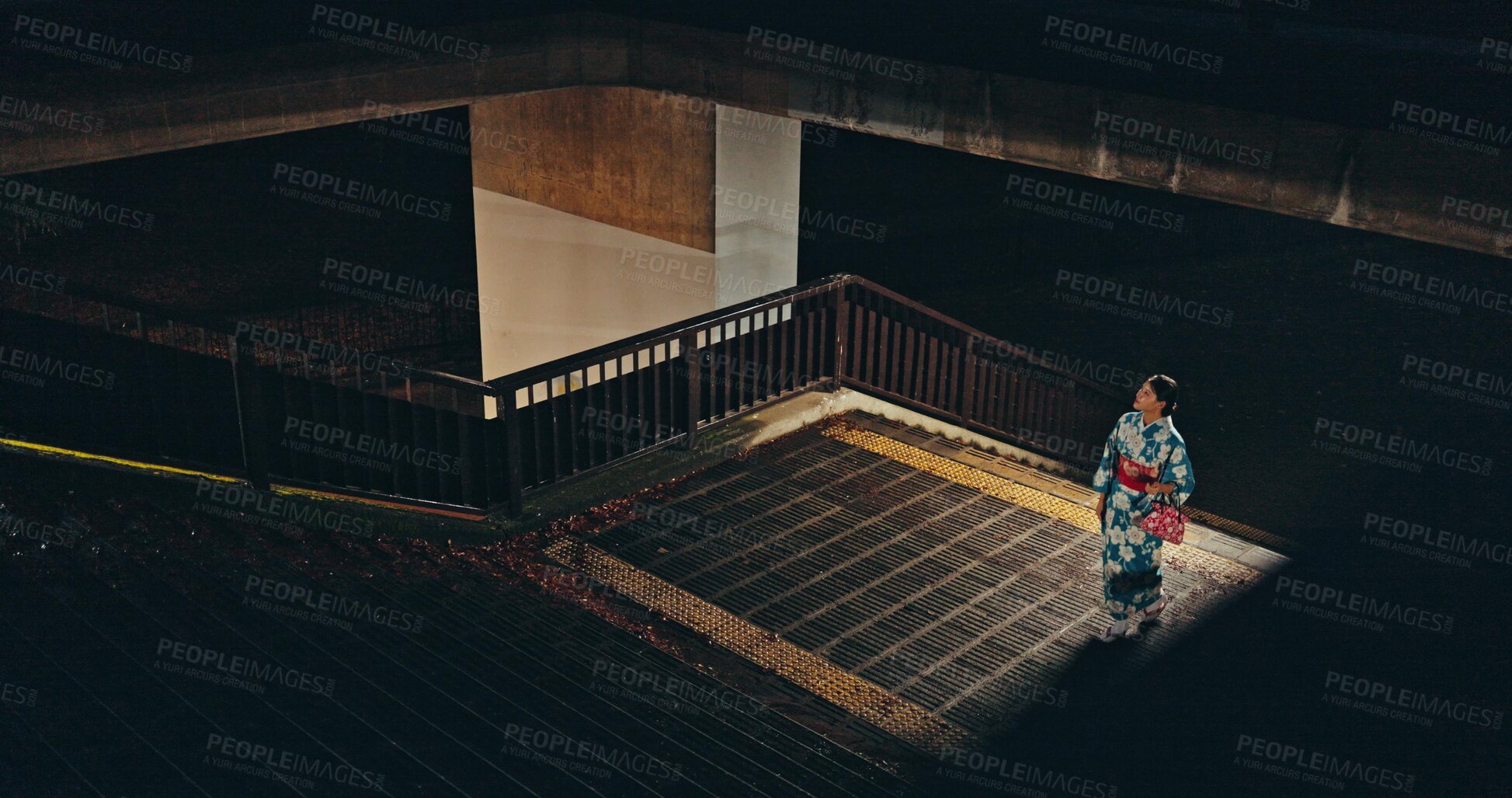 Buy stock photo Japanese woman, kimono and culture on stairs at night, city and religion for heritage by outdoor. Young person, relax or traditional clothes in tokyo in respect, steps or pride in indigenous fashion