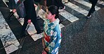 Woman, Japanese traditional clothes and walk in city, view and travel with journey outdoor. Fashion, adventure and urban street in Kyoto, kimono or dress for culture and style with local trip
