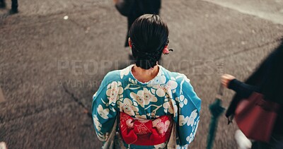 Buy stock photo Japanese woman, kimono and travel on city for culture, respect and religion in heritage celebration. Young person, relax or traditional clothes in tokyo by back, steps or beauty in indigenous fashion