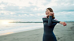 Surfer, beach and woman with happiness, stretching and vacation with getaway trip, seaside and training. Person, Japan and girl with ocean, waves and exercise with journey, muscle and wellness
