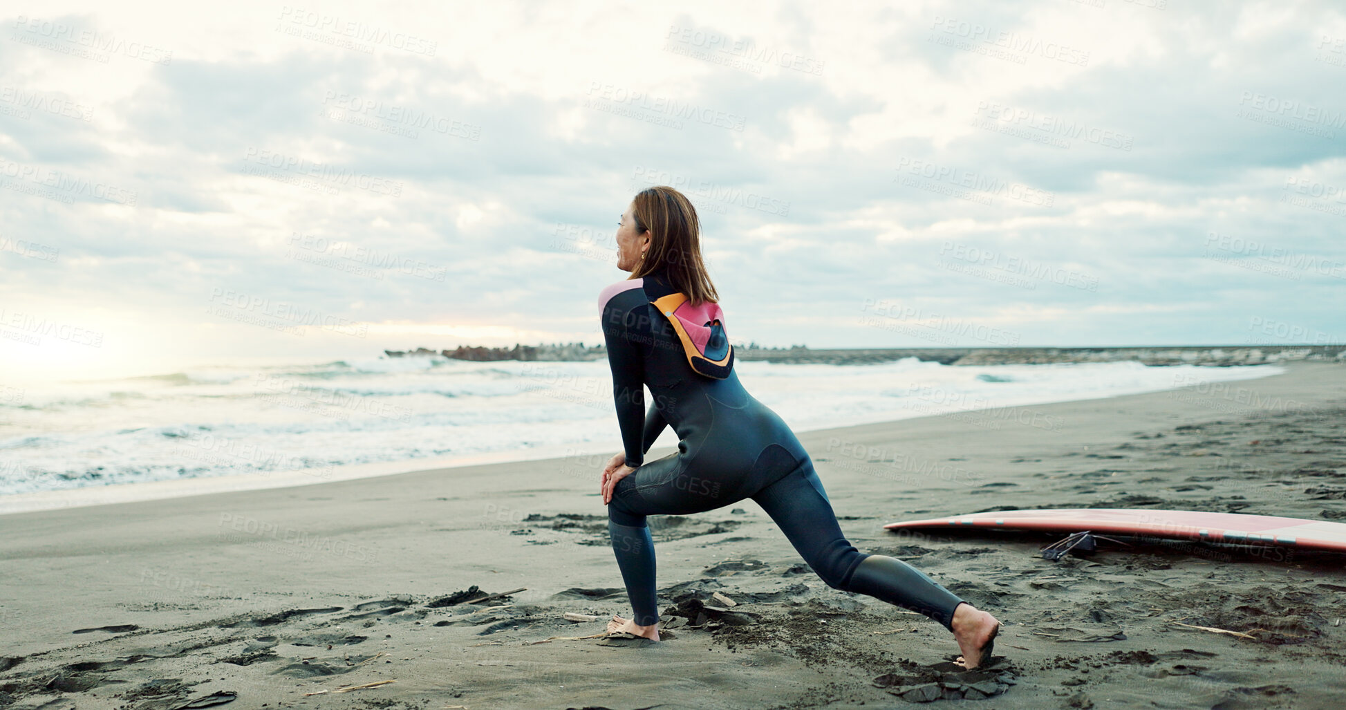 Buy stock photo Surfer, woman stretching at beach and back, fitness for extreme sports with ocean, waves and travel. Flexibility, warm up and exercise outdoor, surf and nature with surfboard and athlete on adventure