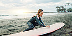 Surfing, ocean and woman with wax for surfboard for water sports, fitness and freedom on beach. Nature, travel and happy Japanese person on sand for wellness on holiday, vacation and adventure by sea
