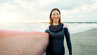 Portrait, woman and smile for surfing at beach, sea and ocean for summer holiday, travel and adventure. Happy Japanese surfer with surfboard for water sports, freedom and relax for tropical vacation