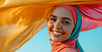 Muslim, portrait and woman wearing a traditional scarf or hijab for beauty fashion, modesty, and Islam. Confident, vibrant and beautiful shot of girl with colorful textile for awareness and hope