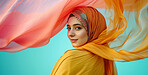 Muslim, portrait and woman wearing a traditional scarf or hijab for beauty fashion, modesty, and Islam. Confident, vibrant and beautiful shot of girl with colorful textile for awareness and hope