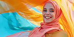 Muslim, portrait and woman wearing a traditional scarf or hijab for beauty fashion, modesty, and Islam. Confident, vibrant and beautiful shot of girl with colorful textile for awareness and hope