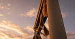 Torii gate, sunset and sky in Japan with clouds, zen and spiritual history on travel adventure. Shinto architecture, Asian culture and calm nature on Japanese landscape with sacred monument at shrine