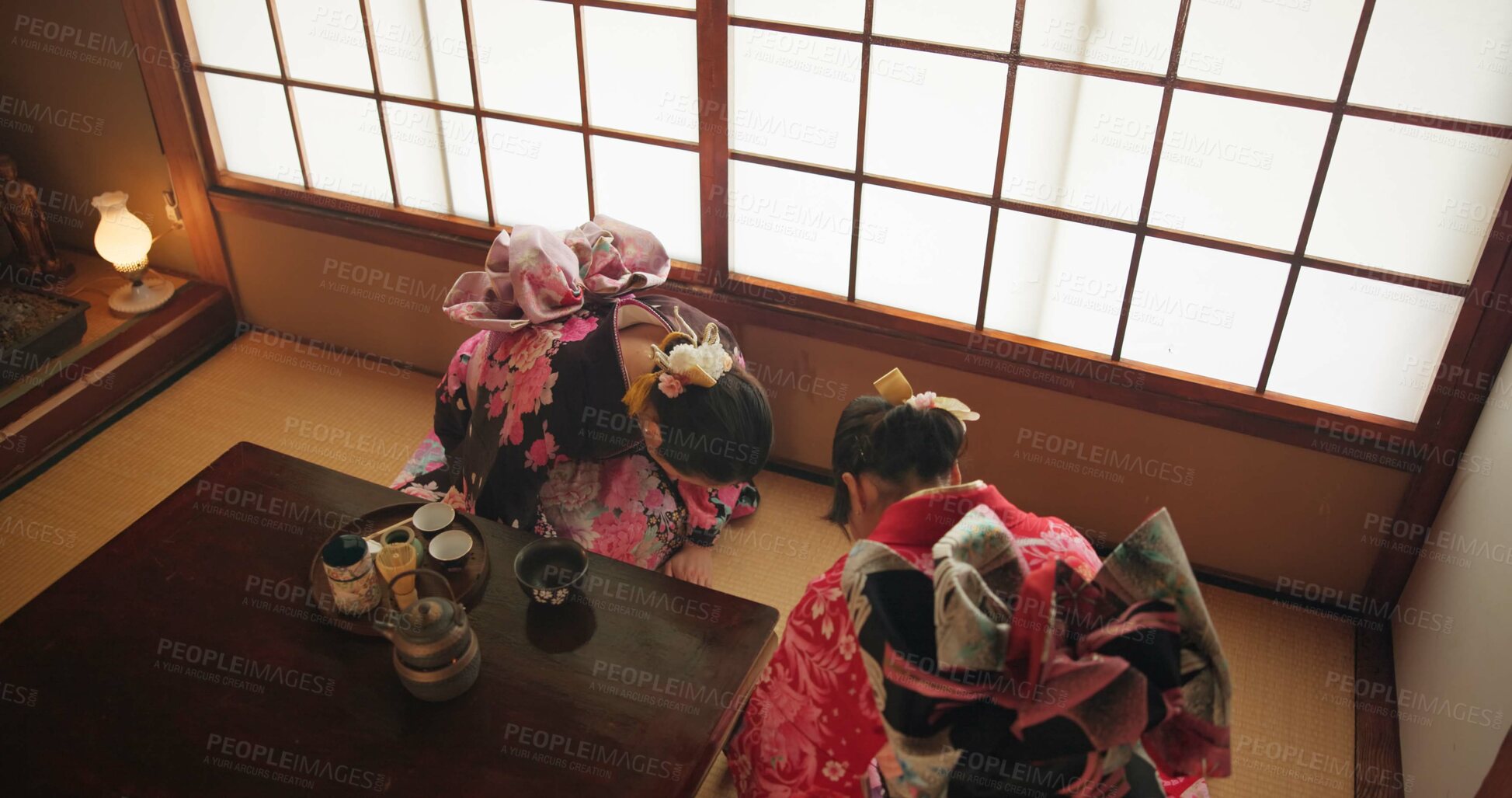 Buy stock photo Tea ceremony, Japanese women and bow with hospitality and respect for ancient culture and ritual. Temae, calm and zen with healing, detox and matcha drink for heritage and traditional religion above