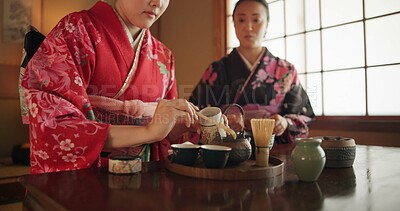 Buy stock photo Traditional, teapot and Japanese women with tea for culture with herbs, leaves and flavor in home. Ritual, indigenous and people with herbal beverage for calm, ceremony and drinking for wellness