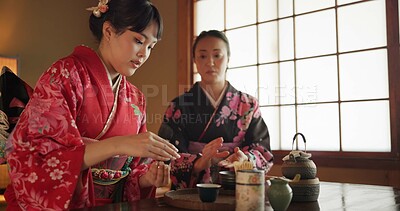 Buy stock photo Japanese, people and kimono for tea ceremony in Chashitsu room with peace or custom tradition. Women, temae and vintage style dress or talking with culture, fashion and friends with antique crockery