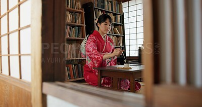 Buy stock photo Painting, Japanese woman and brush with ink, creativity and traditional text with script for paper and Asian writer. Tools, black paint and calligraphy with person at a desk and artistic with hobby