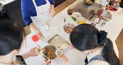 Buy stock photo Japan, women and chef in kitchen with preparation for food, Japanese cuisine and healthy meal in restaurant. Cooking, people and traditional lunch with top view or dumplings for dinner and culture