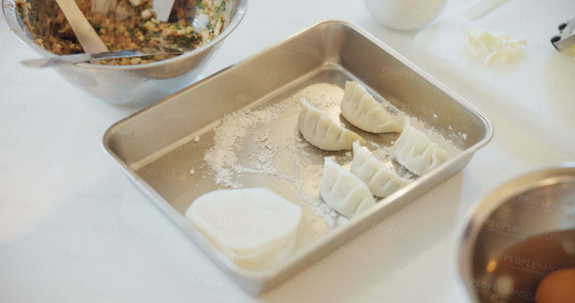 Buy stock photo Japan, dumplings and food on table for dinner, kitchen and traditional meal in restaurant or cafe. Culture, gyozo and asian cuisine for nutrition, healthy diet and lunch with preparation or pastry 