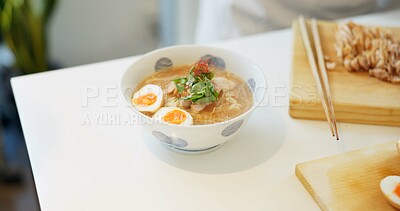 Buy stock photo Ramen noodles, eggs and chopsticks on table in restaurant for lunch, meal or diet in plate. Bowl, food and nutrition with soup in cafeteria with catering service for dinner, snack or health in Tokyo