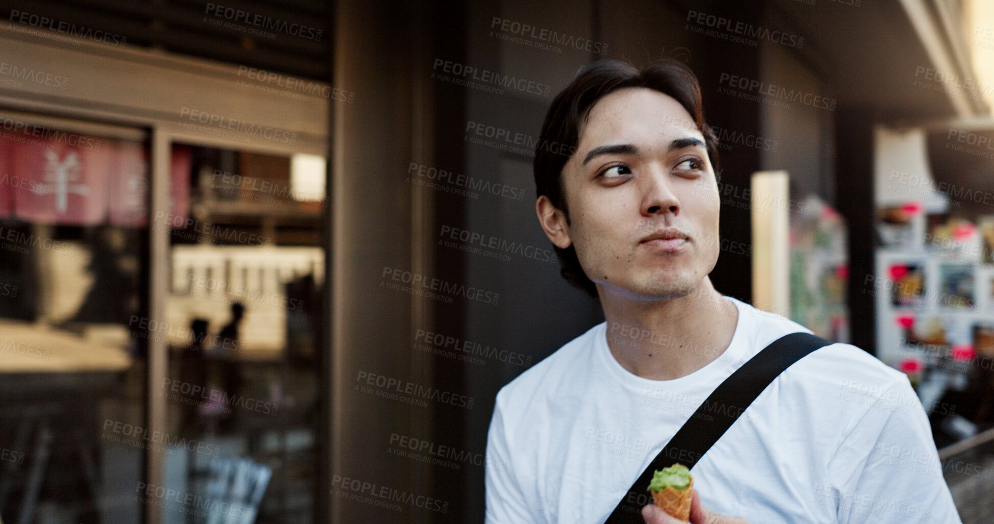 Buy stock photo Walking, travel and Japanese man with ice cream in city on vacation, holiday and adventure in Yokohama town. Summer, weekend trip and person with dessert, sweet snack and cone for tourism destination