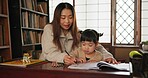 Child, mother and teaching education for home school or drawing in Japanese, learning or development. Female person, girl daughter and pencil project in Tokyo or art book lesson, studying or creative