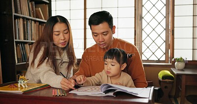 Buy stock photo Mother, father and child teaching drawing at table in Japanese home for school, development or creative. Parents, daughter kid and pencil book project in Tokyo for study or education, art or bonding