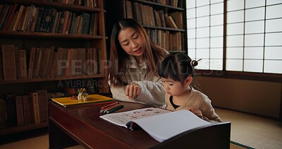 Buy stock photo Mother, child and drawing or teaching with pencil for home schooling student, Japanese or tutor. Female person, daughter and book paper in Tokyo or fun lesson for art studying, creative or activity