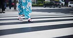 Japanese woman, feet and travel in kimono in city, journey and wellness for heritage celebration. Person, steps and traditional clothes in tokyo for holiday and pedestrian crossing in japan fashion