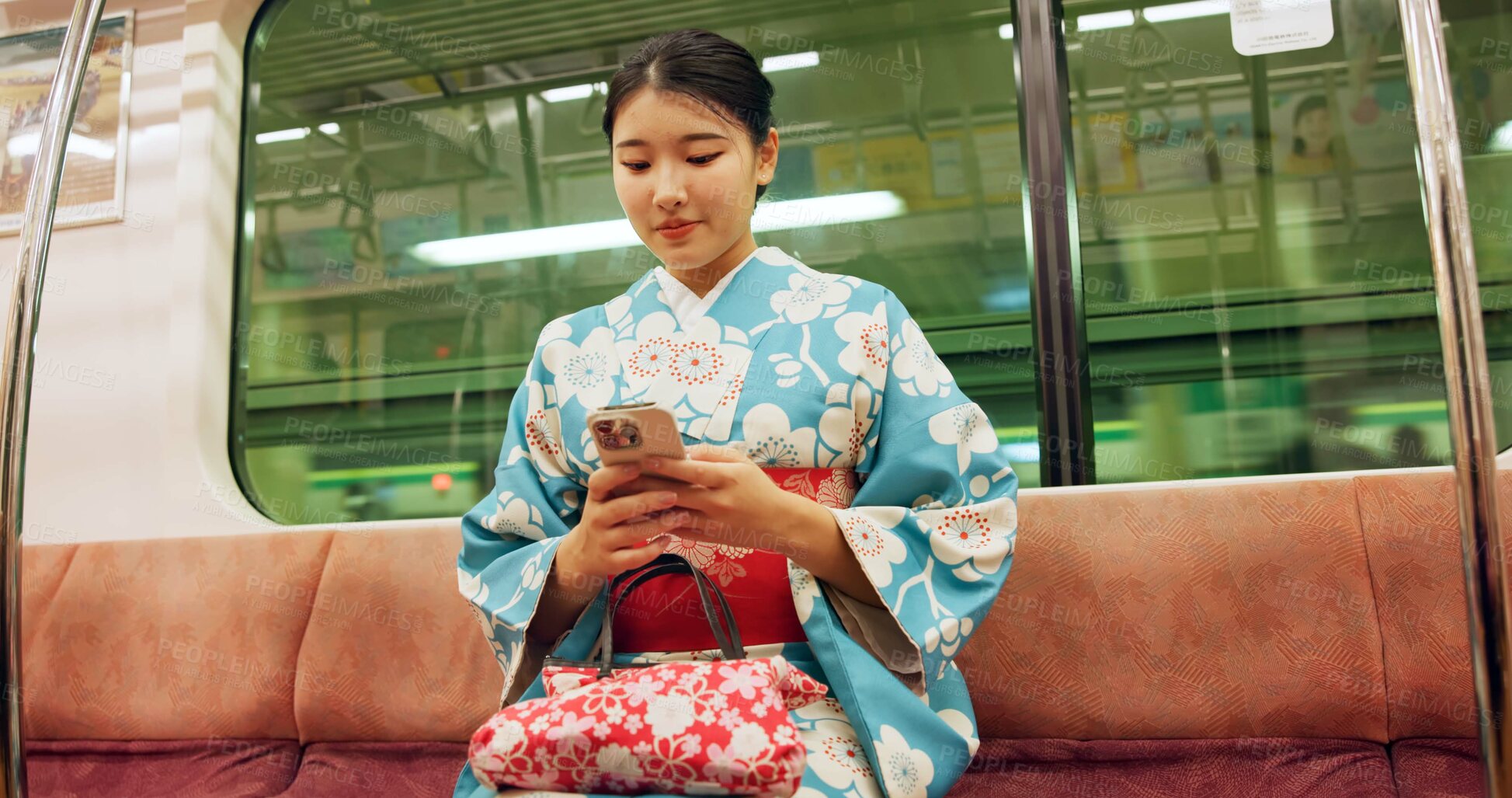 Buy stock photo Woman, japan and train with kimono, phone and travel with public transport, metro bullet in city. Person, journey or traditional clothes in motion blur on weekend or commute in tokyo on adventure