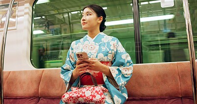 Buy stock photo Woman, japanese and train, phone and kimono with travel,  public transport and metro bullet in city. Person, journey or traditional clothes for fashion, weekend and commute in tokyo on adventure