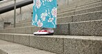 Feet, stairs and person in Japanese kimono for travel, tourism or sightseeing closeup in Tokyo. Shoes, steps and culture with a tourist outdoor in clothes for tradition, vacation or holiday adventure