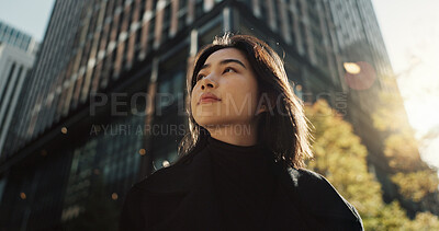 Buy stock photo Walking, building and Japanese woman in city for tourist sightseeing in the street on weekend trip. Travel, adventure and bottom view of young female person commuting in road of town in Kyoto Japan.