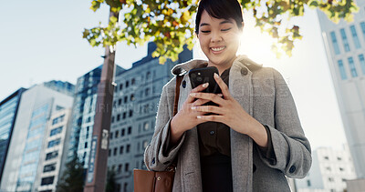 City, business and woman with cellphone, smile and typing with connection, online news and digital app. Japan, person or employee with smartphone, social media or reading a blog with contact or email