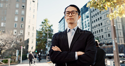 Buy stock photo Businessman, portrait and professional in city street as broker in financial market, confident or Tokyo. Male person, face and corporate career travel at business building or Japan, pride or sidewalk