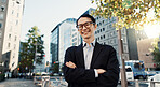 Japanese lawyer man, portrait and city with arms crossed, pride and smile for job at legal agency. Person, attorney or advocate with suit, street and happy on metro sidewalk, road or outdoor in Tokyo
