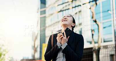 Buy stock photo Businesswoman, cellphone and excited in city street for celebration, achievement or congratulations. Asian person, good news and urban employment or promotion in Tokyo or  career, professional or joy