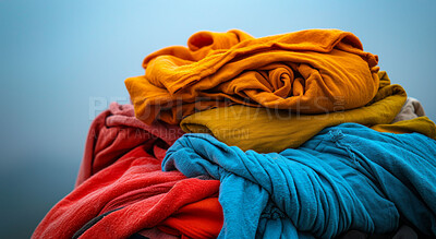 Clothes, fabric and clean laundry background for laundromat business, service or fabric softener. Colourful, pile or dirty clothing backdrop for mockup, product design or eco friendly cleaning