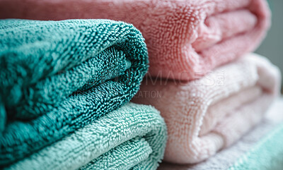 Hotel towel, laundry and clean fabric background for laundromat business, detergent or hygiene. Colourful, neat and stacked fluffy textile for washing softener, cleaning service and eco friendly