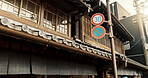Architecture, building and road sign on street for city, traditional infrastructure and culture in urban town. Tourism, neighbourhood and signal, symbols and icon for traffic in Japan for travel