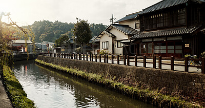 Buy stock photo Houses, building and canal with trees in Japan of architecture, structure or natural scenery in neighborhood. Japanese village, home or outdoor street or stream of quiet or peaceful town in Tokyo