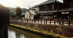 Houses, building and canal with trees in Japan of architecture, structure or natural scenery in neighborhood. Japanese architecture, home or outdoor street or road of quiet or peaceful town in Tokyo