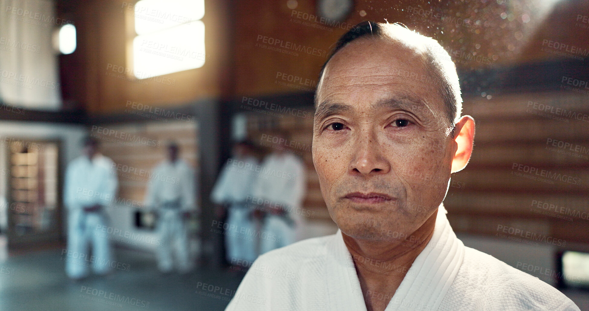 Buy stock photo Sensei, aikido and training dojo for martial arts practice or Japanese traditional sport, fighting or health. Male person, gee uniform and face for fitness challenge or power, champion or confidence