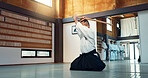 Aikido sword, mature sensei and man teaching class, self defense or combat technique. Martial arts, Japanese person and wooden weapon for skills development, attack demonstration or bokken strike